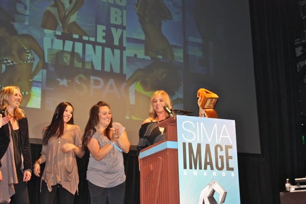 Monica Wise and the L*Space team accept the award for Swim Brand of the Year for a fourth straight time. Photos by Shop-eat-surf. Monica Wise and the L*Space team accept the award for Swim Brand of the Year for a fourth straight time. Photos by Shop-eat-surf.