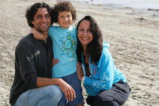Surf Diva President Coco Tihanyi with husband