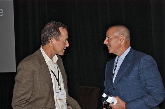 PacSun CEO Gary Schoenfeld talking with Urban Outfitters CEO Glen Senk at the ICR XChange.