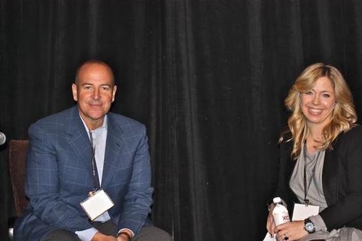 Urban Outfitters CEO Glen Senk and analyst Samantha Panella at the ICR XChange in January. Shop-eat-surf file photo.