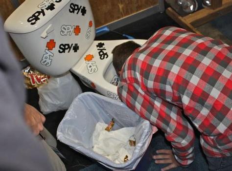 A game at the Spy booth at Surf Expo. Shop-eat-surf file photo.