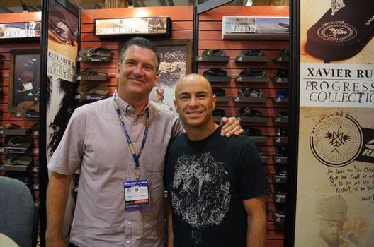 Reef President Jeff Moore and surfer Shane Dorian at Outdoor Retailer. Photo by Shelby Stanger.
