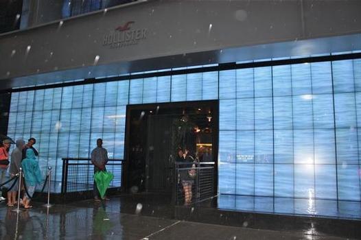 The Hollister store on Fifth Avenue features 179 monitors showcasing live feeds from Huntington Beach. Shop-eat-surf file photo.