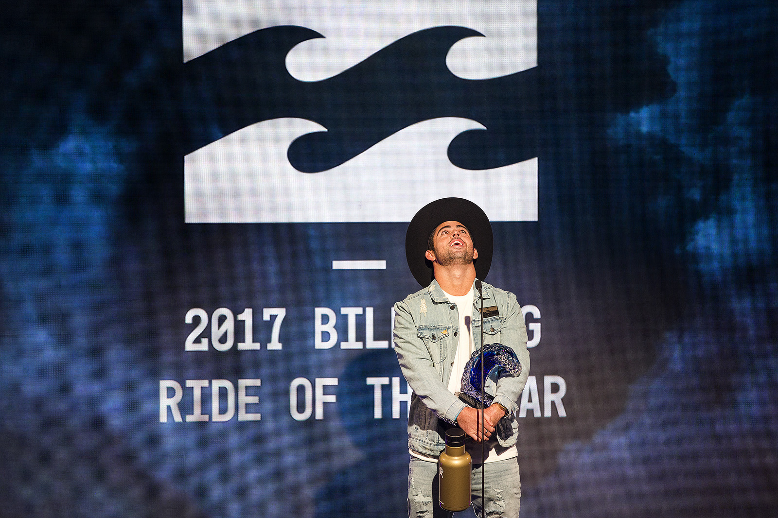 Billy Kemper celebrates his Billabong Ride of the Year win at the 2017 WSL Big Wave Awards in Huntington Beach