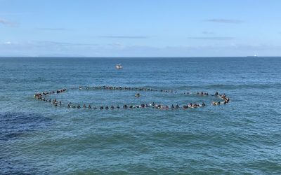 Photos from Pierre Agnes Paddle Out in HB