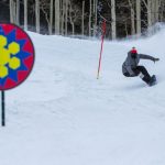 Micah Green flying through the berms during the Banked Slalom