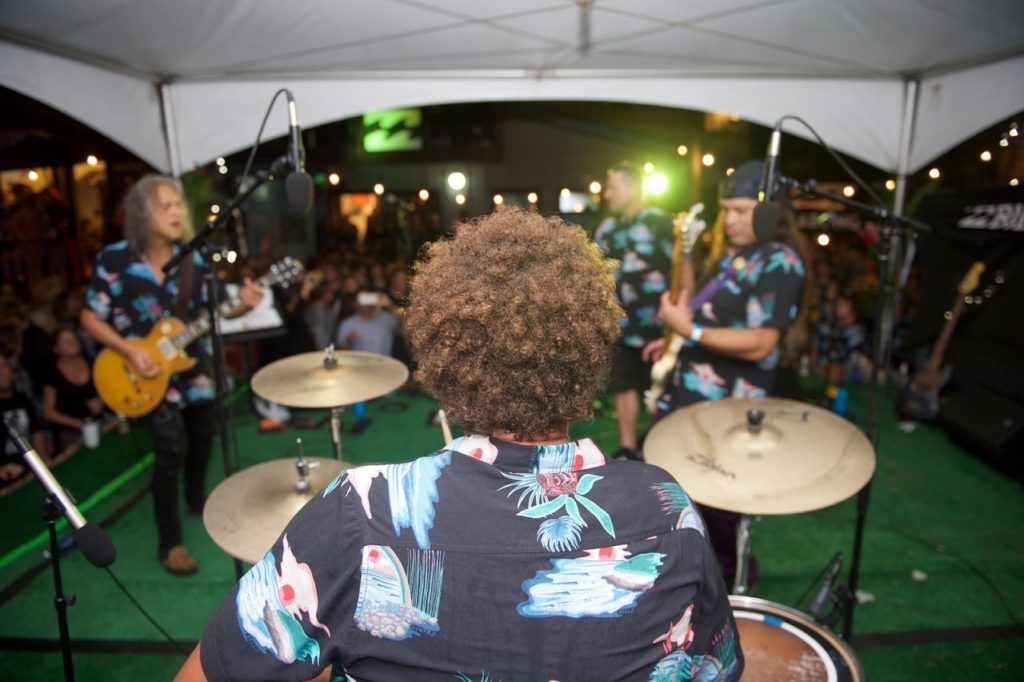 Even the band wore the shirts with Joel's print. The band included Kirk Hammett, far left, and Robert Trujillo, far right, of Metallica.
