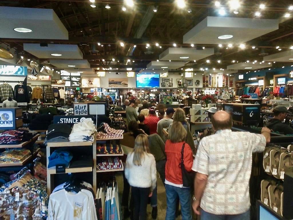 Lines at Surfside Sports in Costa Mesa Friday