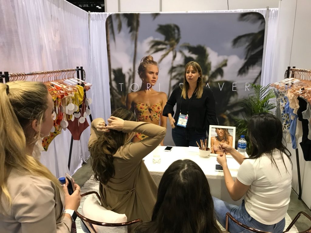 Everything But Water buyers in the Tori Praver booth