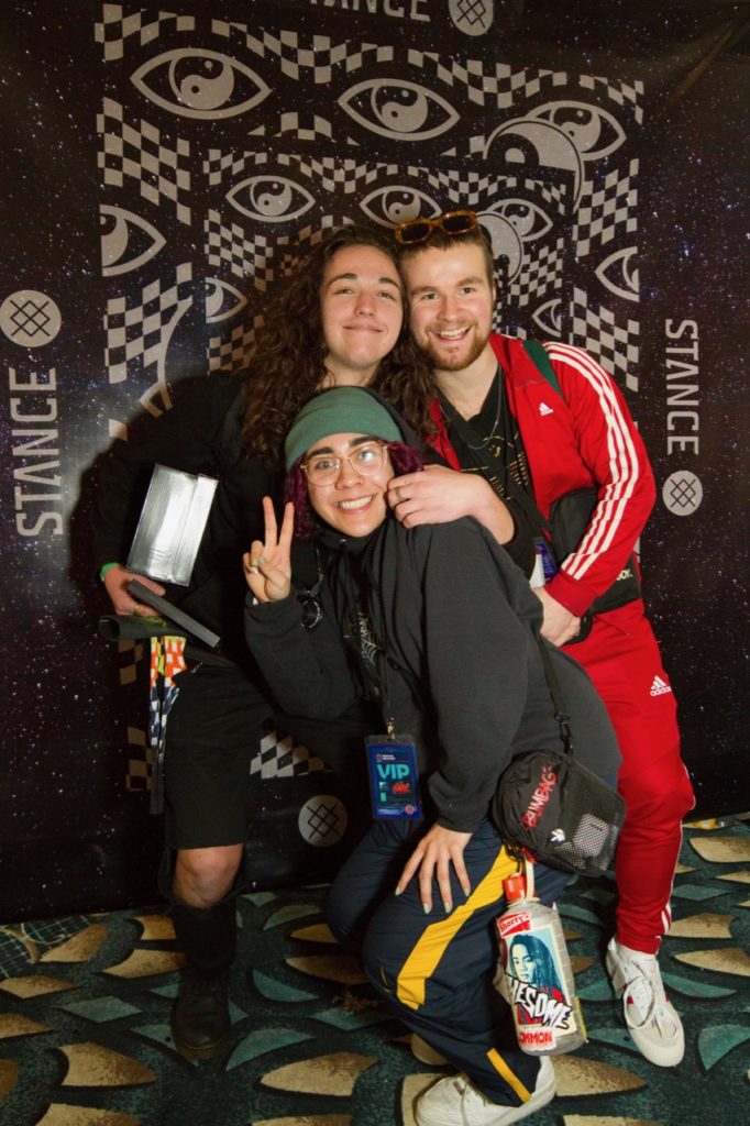 Employees posing for photos at the Stance Wall - Photo courtesy of Zumiez