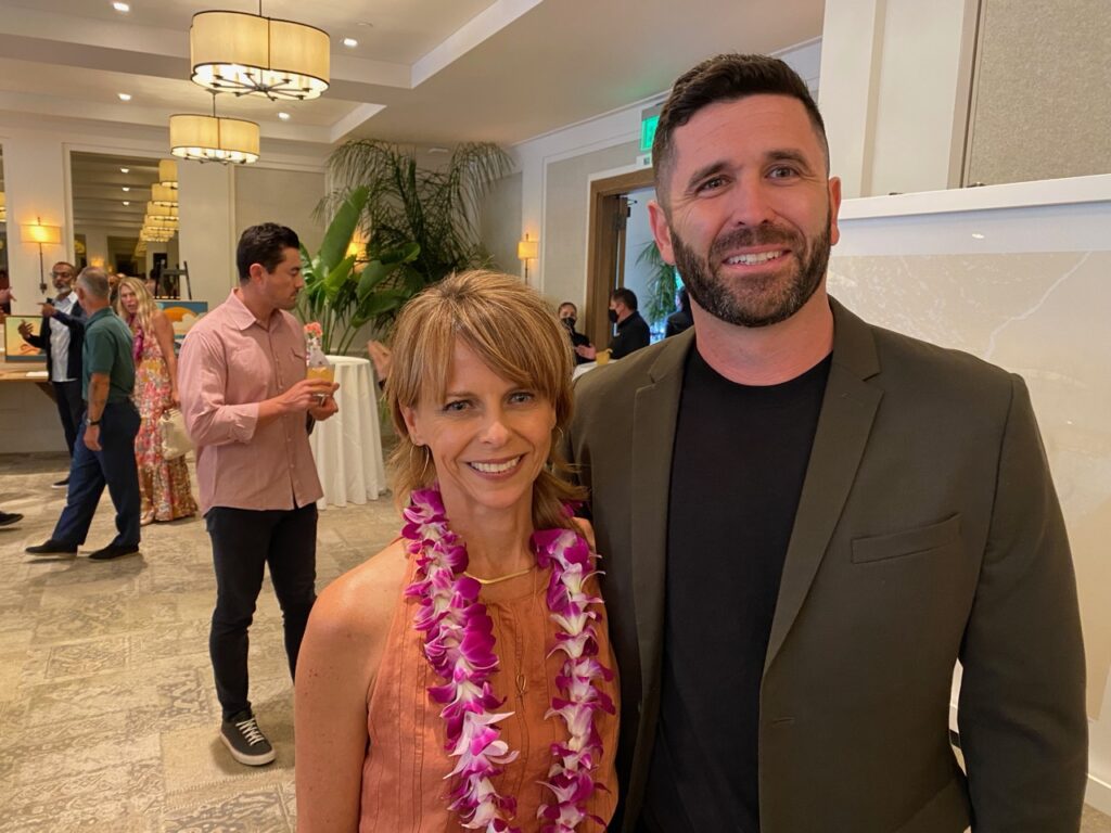Karen Sarver of Vissla and  Mike Wallace of Billabong