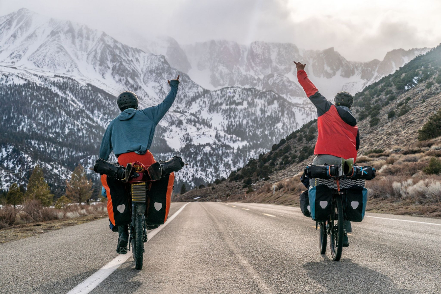 Two cyclists ride in Patagonia gear