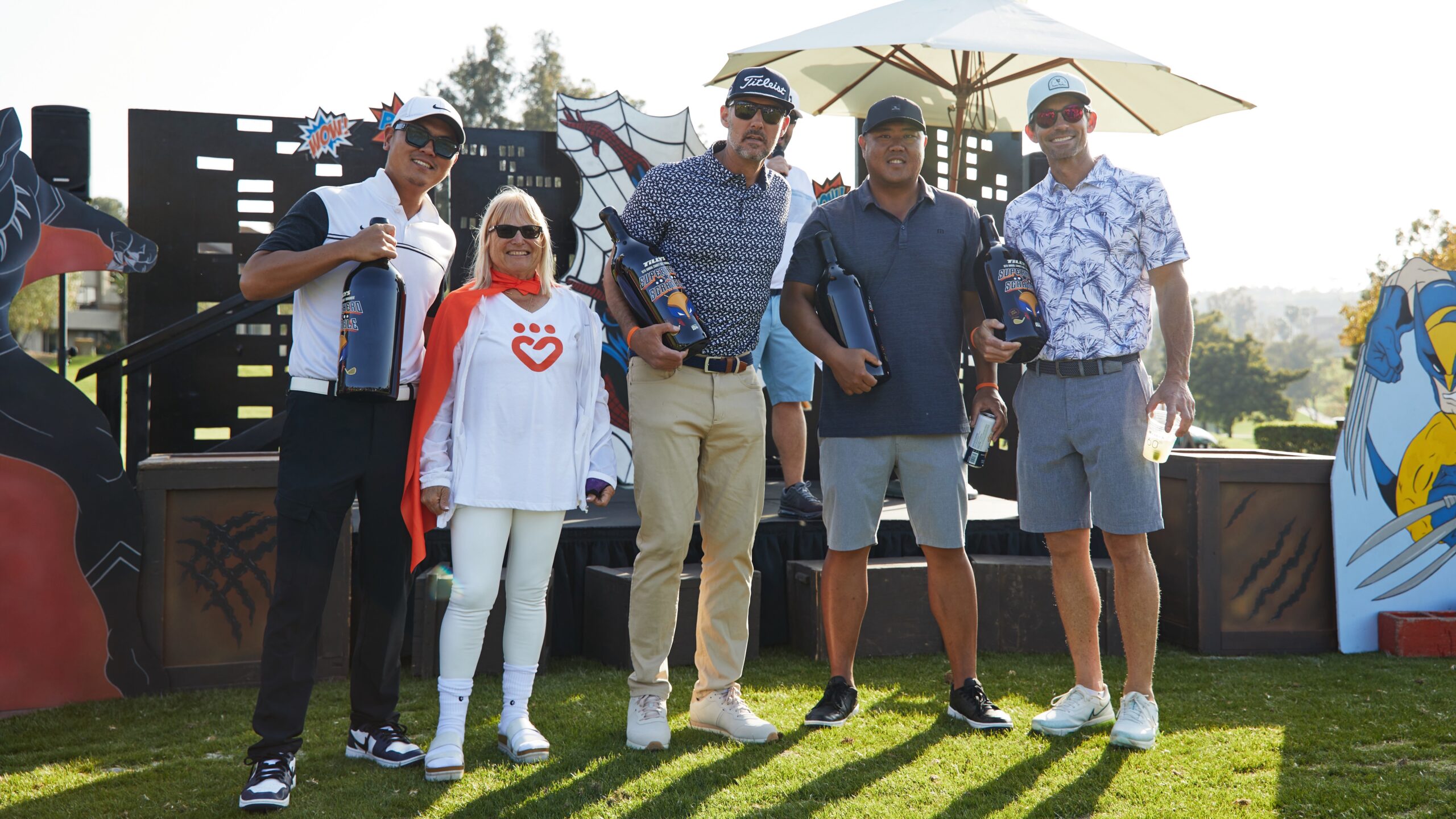 TILLYS 16th Annual Golf Tournament. Winning foursome, Emory Park, poses with Tilly Levine at cocktail party awards ceremony