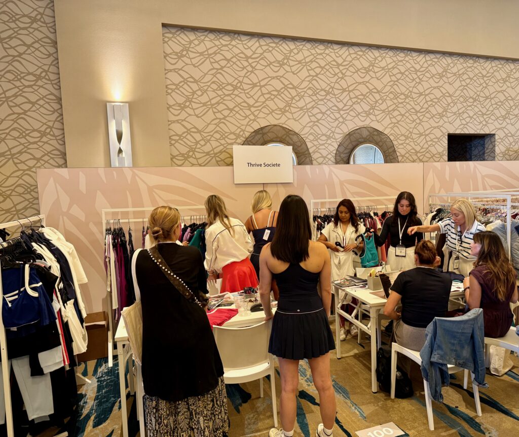 A busy Thrive Societe activewear booth. Photo by SESO.