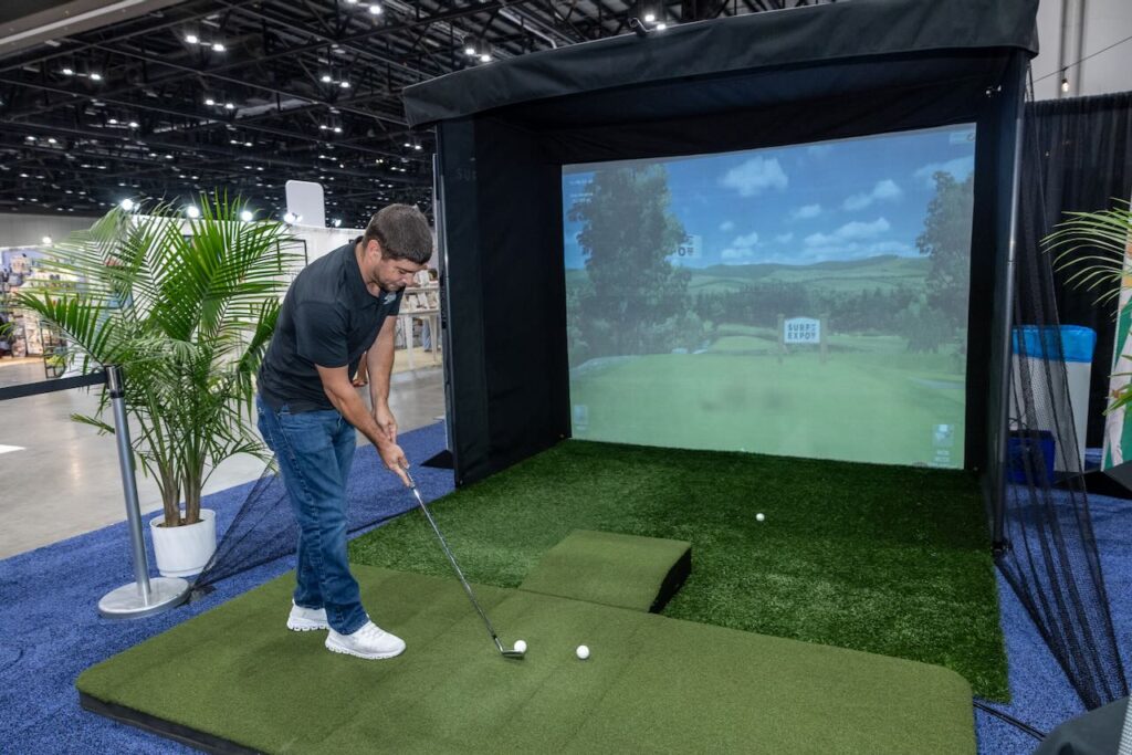A golf simulator on the show floor. Photo courtesy of Surf Expo. 