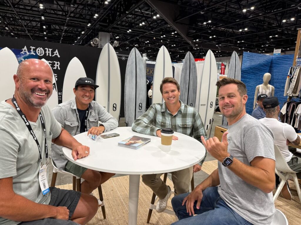 Marty Mathiesen, Franklin Shiraki, Dylan Slater, and LG Shaw in the Firewire/Outerknown booth. Photo by SESO. 