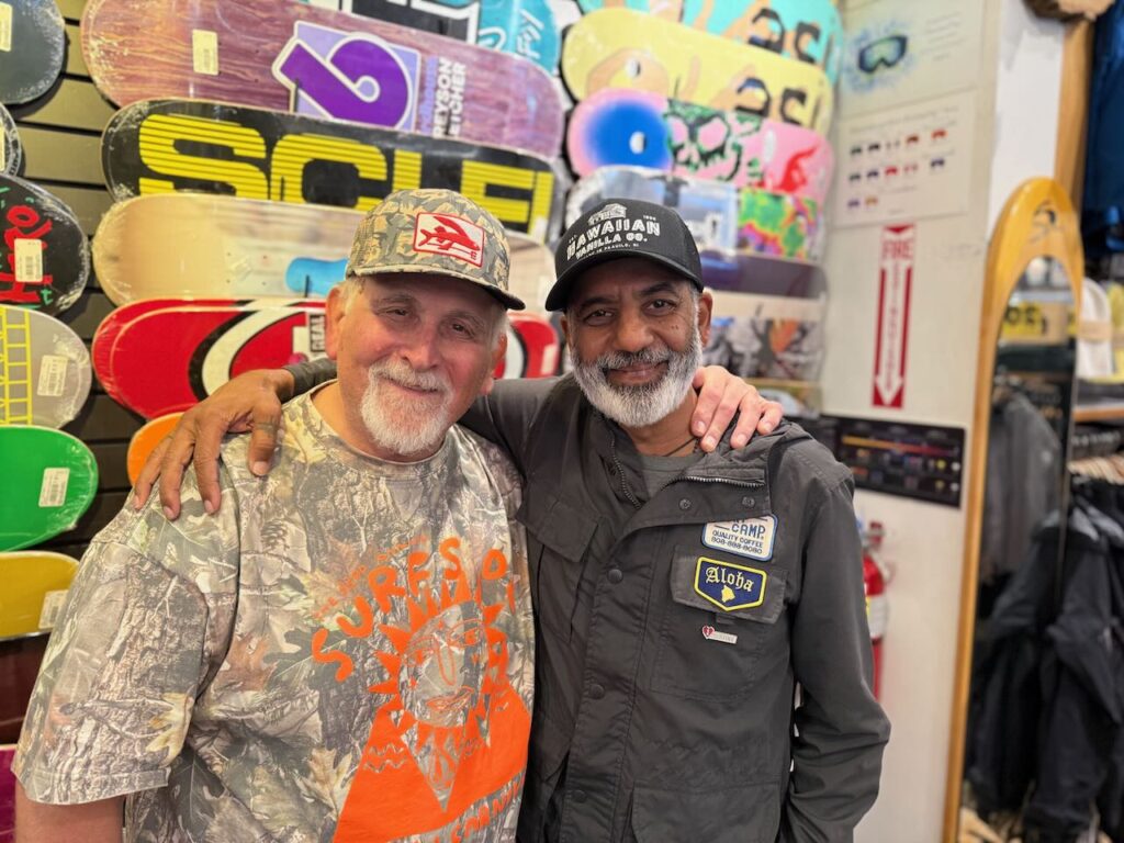 Surfside's Duke Edukas with SIMA Executive Director Vipe Desai. Photo by SESO. 