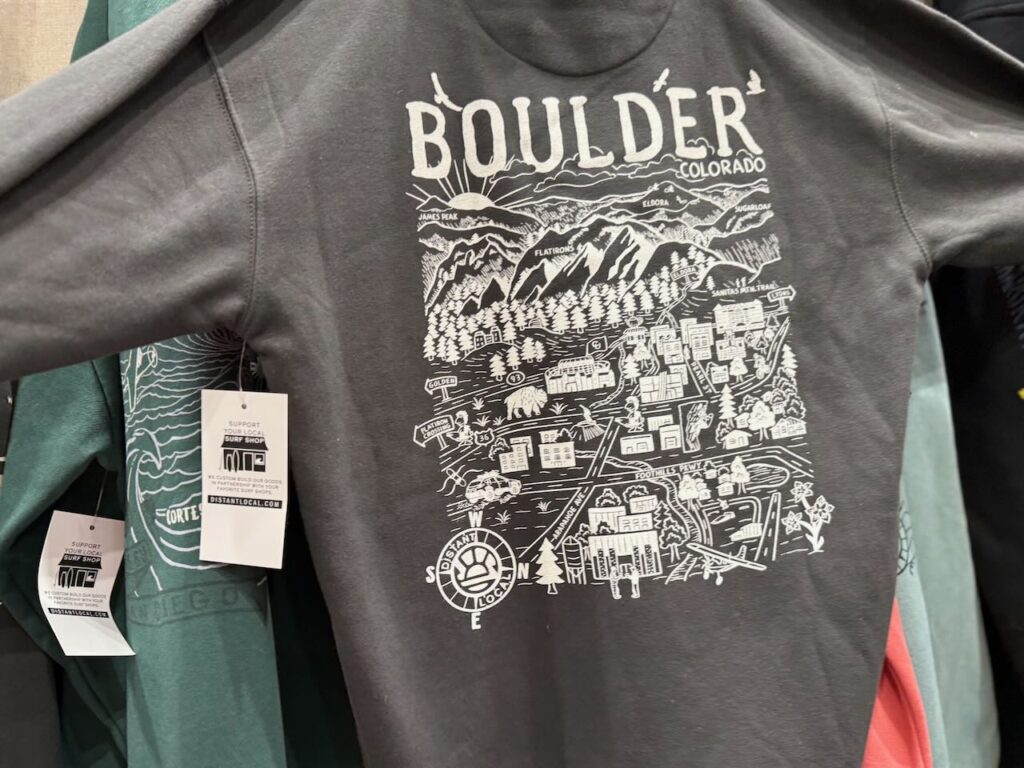 Distant Local, which has a thriving destination T-shirt business partnering with specialty retailers, is expanding to mountain towns. 