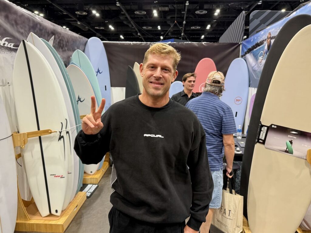 Surf star Mick Fanning at The Surfboard Agency booth. 