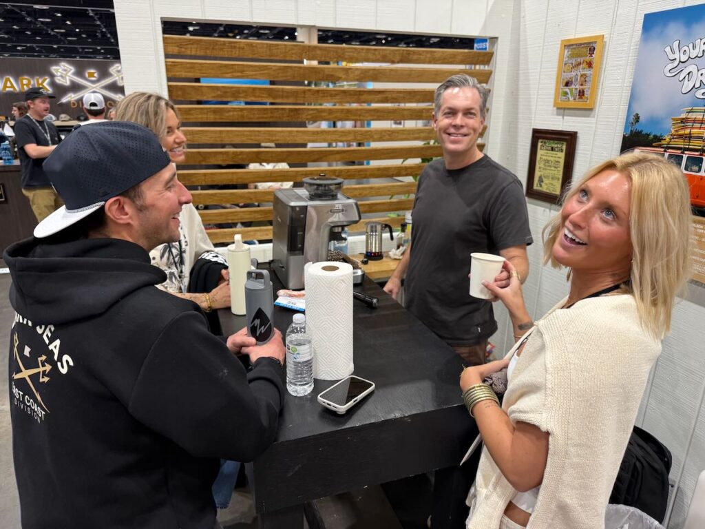 Mac Beu of Katin whipping up coffees for the Cinnamon Rainbows team. 