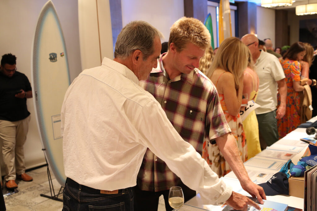 Vissla CEO Paul Naude with Steko Founder Kolohe Andino. Photo by Ian Kose, courtesy of SIMA.