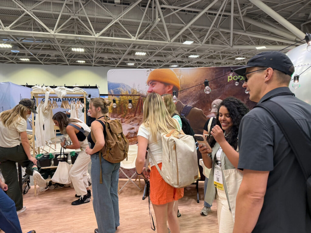 Content Creators getting set up at the Popfly booth before hitting the floor. Photo by SESO. 