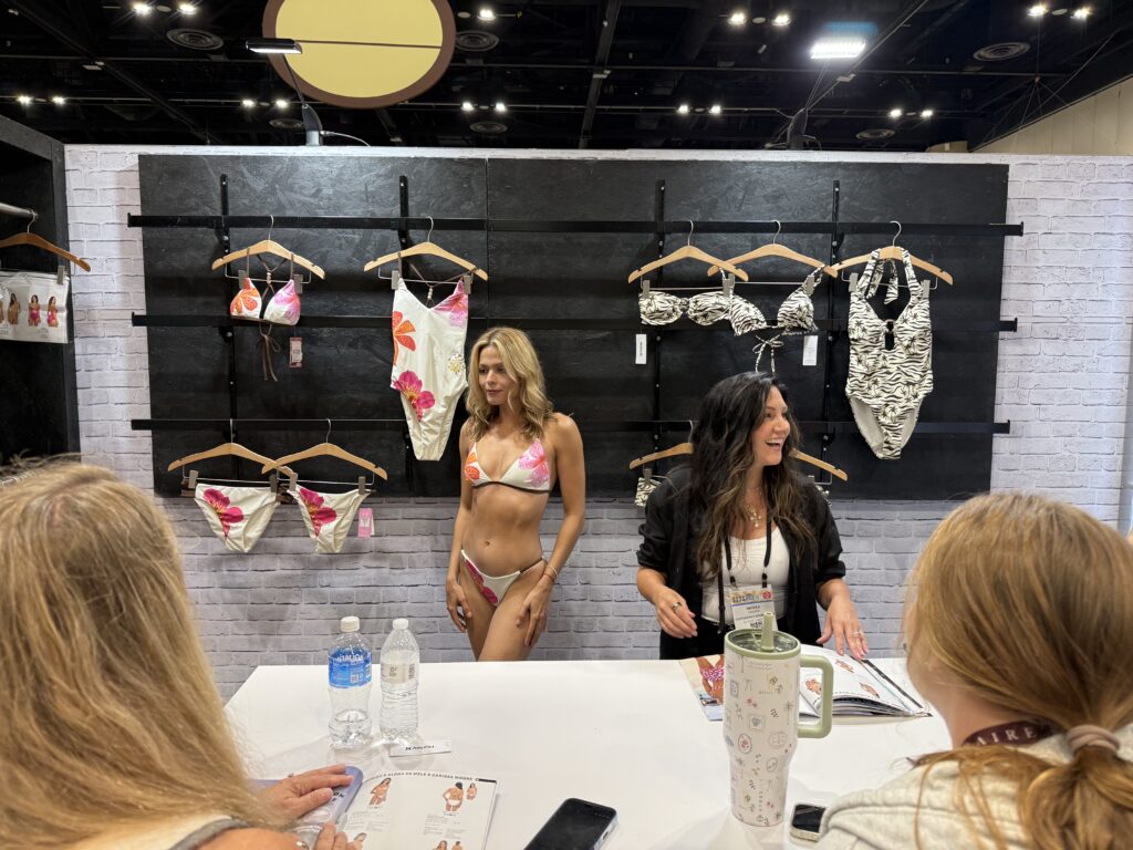 A model at the Hurley booth wearing an upcoming Hurley collaboration with Carissa Moore. Photo by SESO.