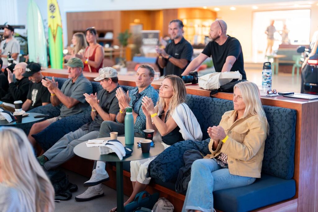 Listening to the presentations. Photo by Dipan Desai Photography.
