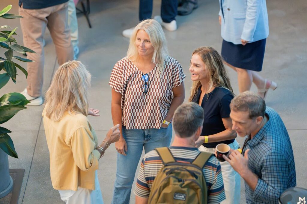 Mingling at the SIMA Super Summit. Photo by Dipan Desai Photography.
