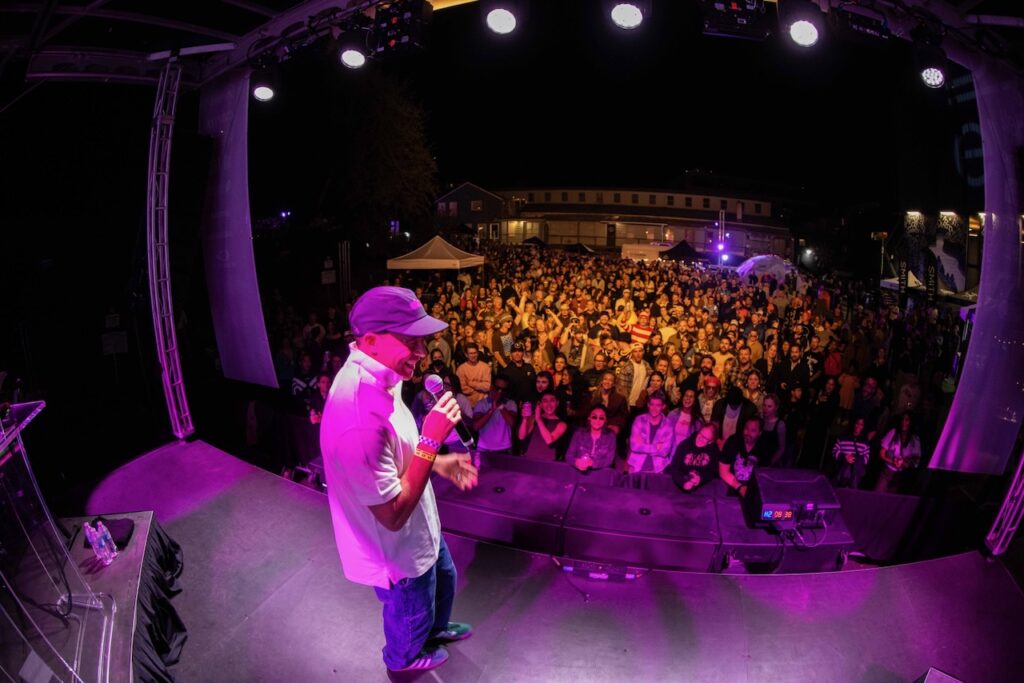 Evo founder and CEO Bryce Phillips addressing the crowd at the company's 25th anniversary party. Photo courtesy of evo.